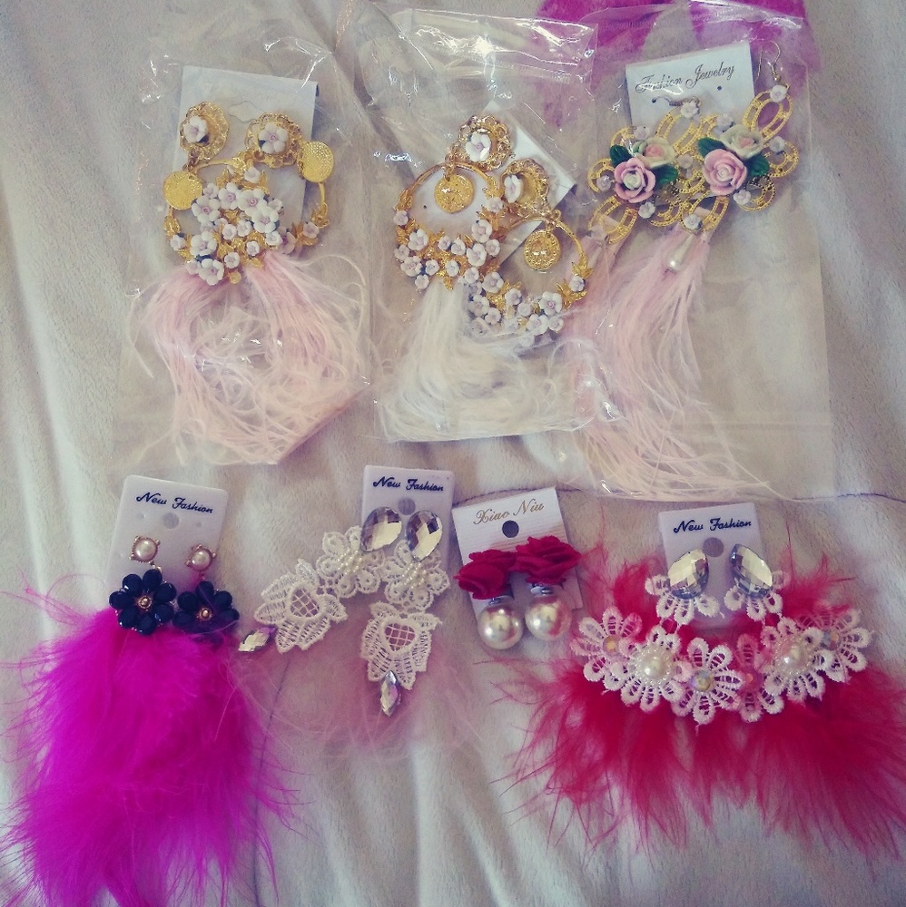 Feather earrings.